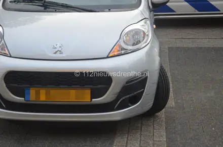 Pizzakoerier gewond bij aanrijding in Assen — foto 3 van 3