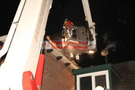 Twee gewonden bij woningbrand in Coevorden — foto 7 van 12